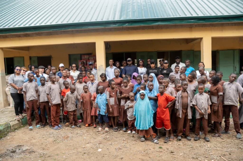 Paulo Group team with children outside an orphanage during the outreach